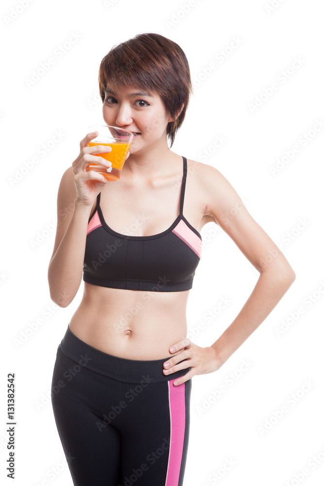 Beautiful Asian healthy girl drinking orange juice. Beautiful Asian healthy girl drinking orange juice.