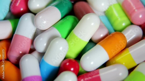 pills are of different color. video rotation photo