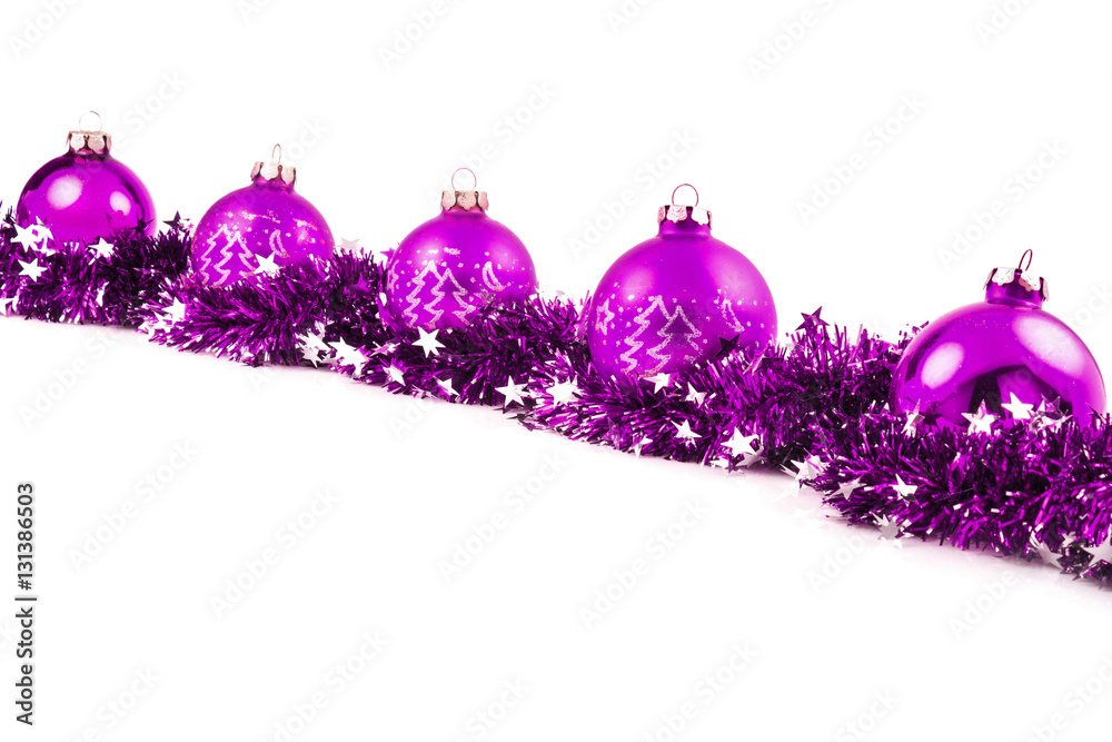 Christmas background with violet balls and garland