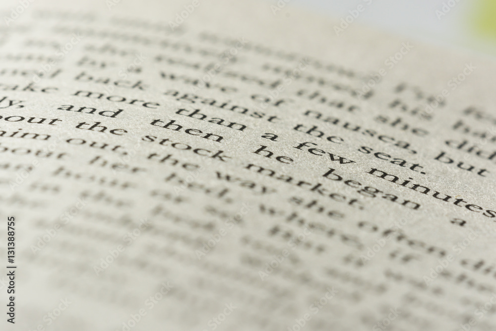 closeup phrase in English book with another words blurry closeup phrase in English book with another words blurry