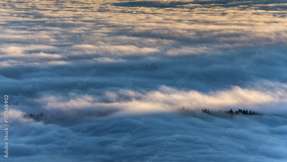 Beutiful Sunrise above the clouds.