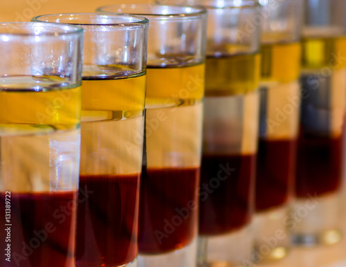 Short cocktail glasses several layers © beletskaya18