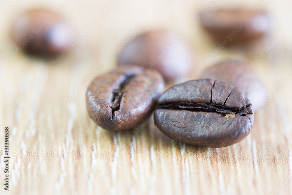 Seeds of coffee on brown plate / Blurred and Select focus image
Seeds of coffee on brown plate / Blurred and Select focus image