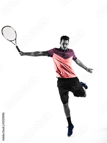 Young man is playing tennis © takoburito