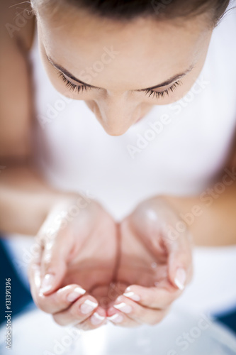 Young Woman Washing Her Face
