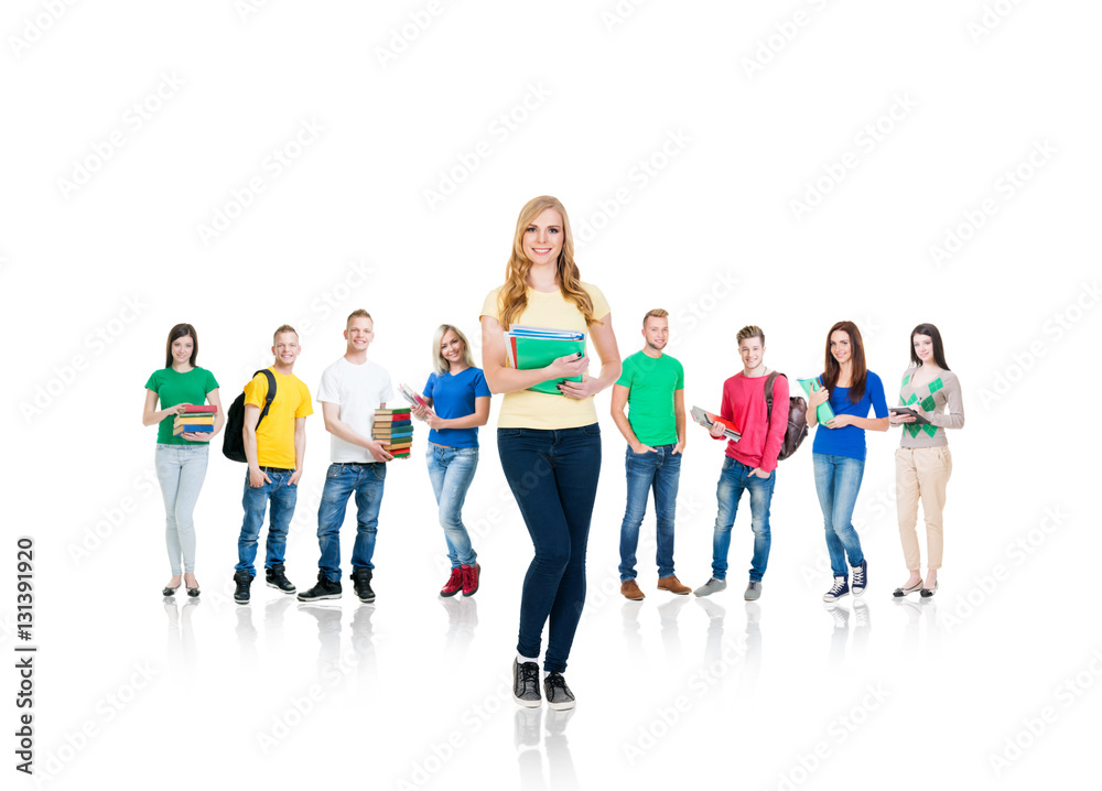 Fototapeta premium Large group of teenage students on white