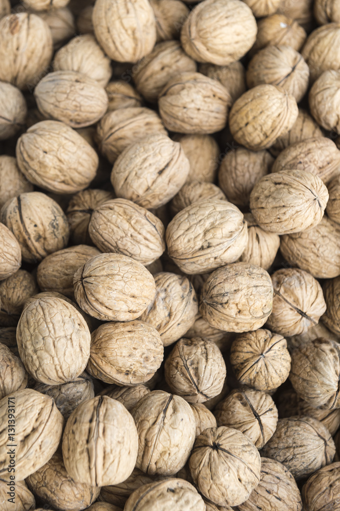 Background of walnuts in their shells at an outdoor market in Turkey Background of walnuts in their shells at an outdoor market in Turkey