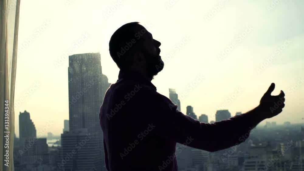 Desperate, sad man standing by window at home, super slow motion 240fps
Desperate, sad man standing by window at home, super slow motion 240fps