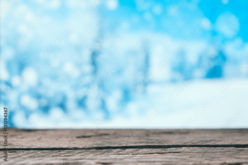 Wooden boards on the winter blur background Wooden boards on the winter blur background