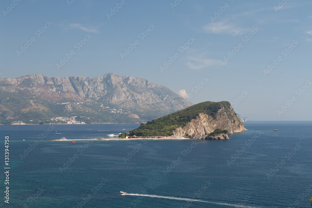 St. Nicholas Island in the background of mountains. Montenegro