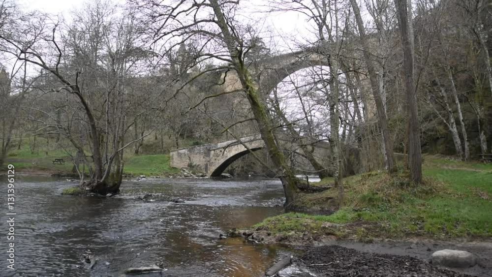 A river that passes under two old bridges A river that passes under two old bridges