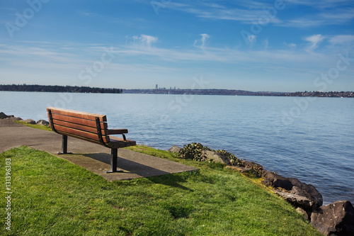 Bench at a lakeside park overlooking Lake Washington in Spring sunshine © Jo Ann Snover