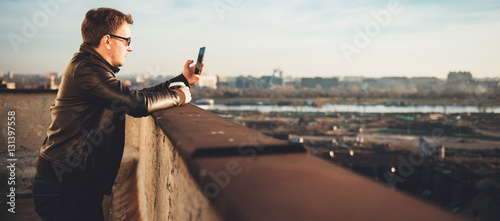 Man using smart phone