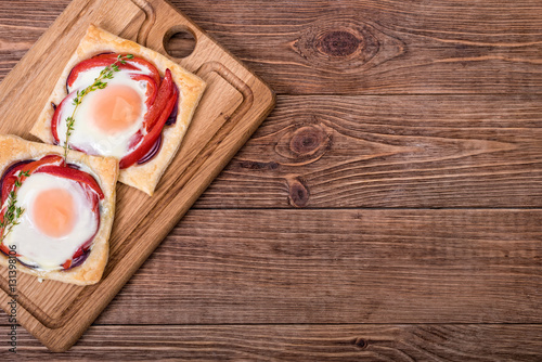 Red pepper and baked egg galettes .