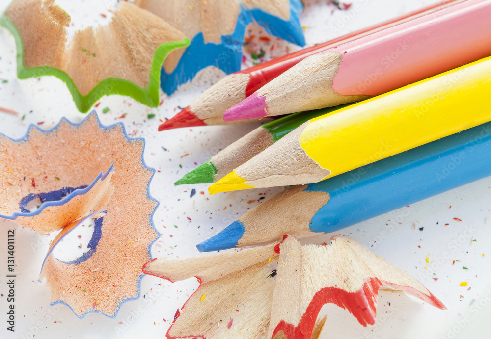Sharpened colourful pencils and wood shavings