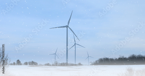 Snow falling with wind turbines