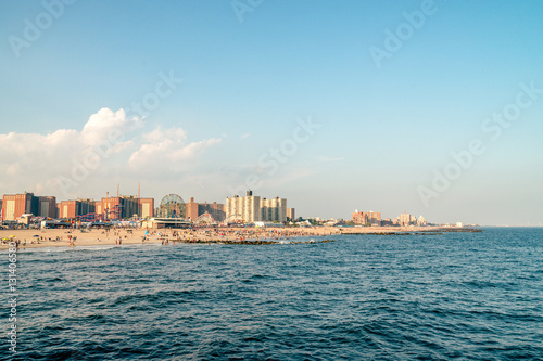 Roller coaster and buildings cityscape on the Brighton Beach. It is known for its high population of Russian-speaking immigrants, and as a summer destination for New York City residents.