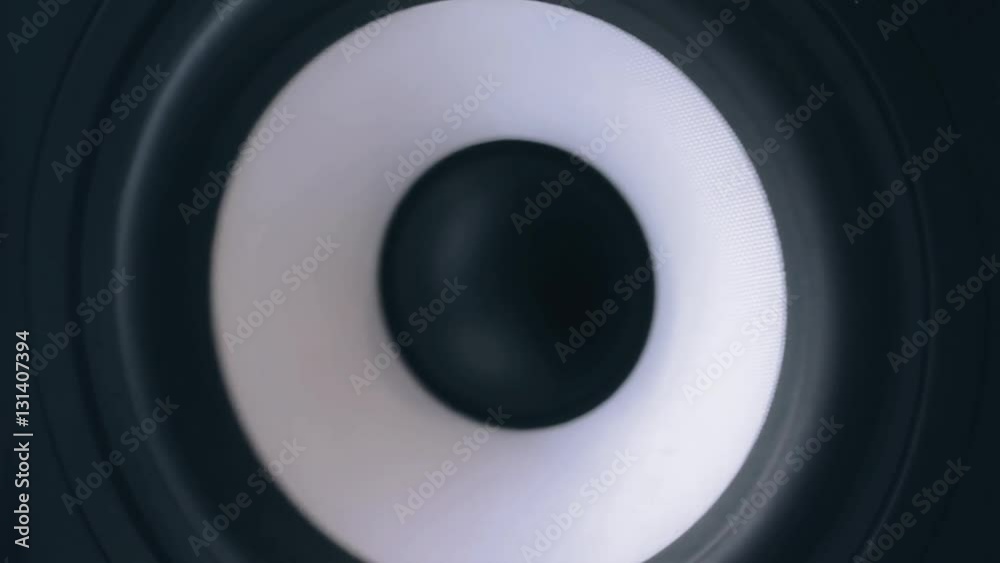 Closeup at moving sub-woofer. Speaker part. Closeup at moving sub-woofer. Speaker part.