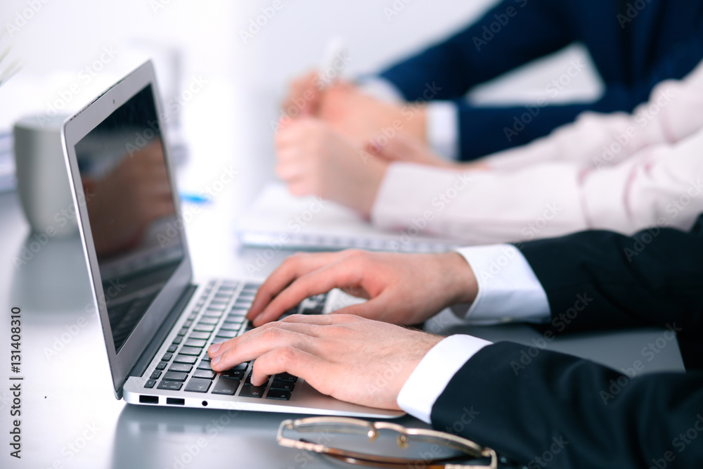 Group of business people working together in office Group of business people working together in office