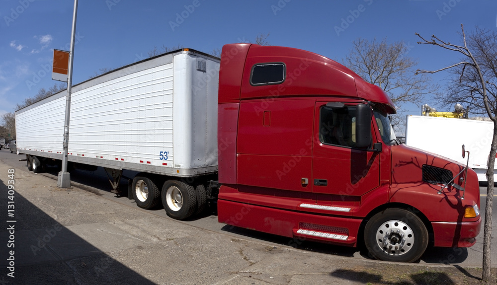 Red and white semi truck and trailer. Red and white semi truck and trailer.