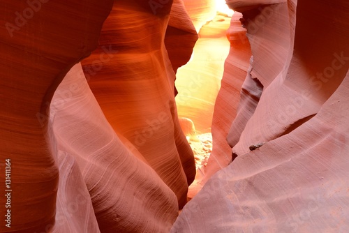 Red Rocks - The midday sun lights up the colorful sandstone rocks in a high desert slot canyon.