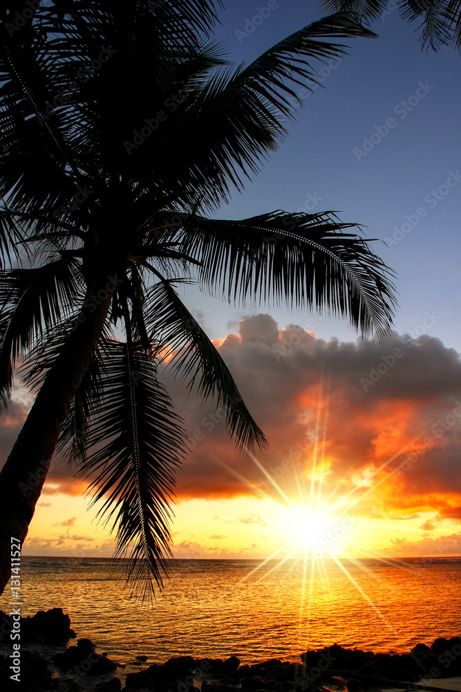Colorful sunrise  on the beach in Lavena village in Taveuni Isla
