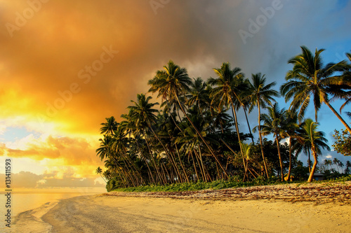 Colorful sunrise on the beach in Lavena village in Taveuni Isla