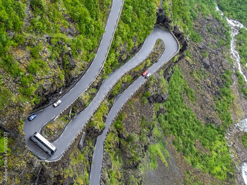 Overhead view of coach going round hairpin bend on narrow Trollstigen mountain road in Norway