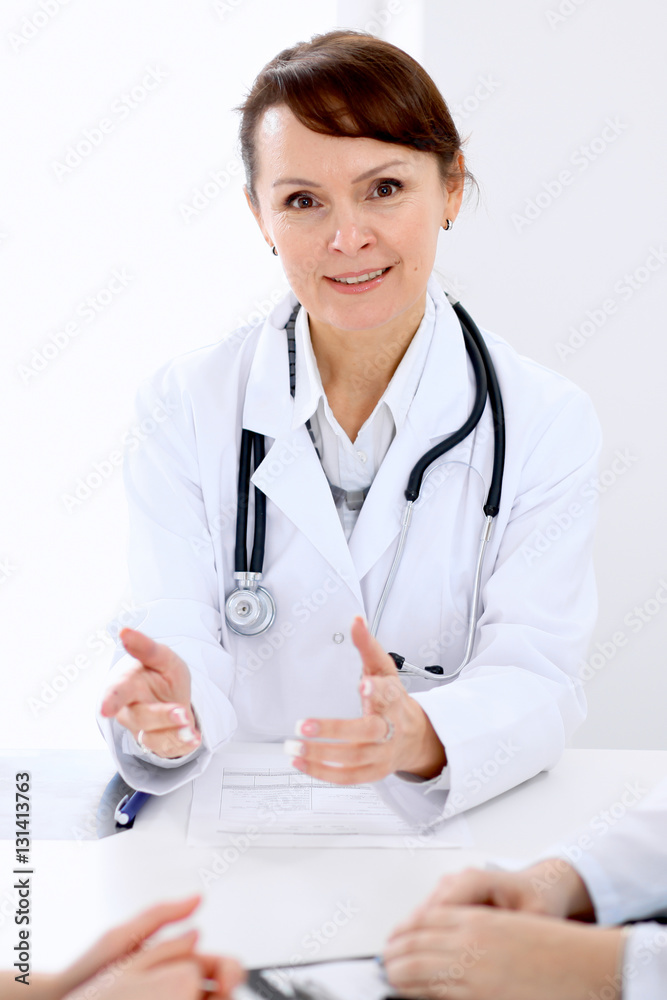 Doctor and patient at meeting. Medicine and health care concept. Doctor and patient at meeting. Medicine and health care concept.