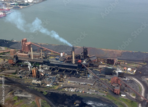  aerial of a heavy industrial area along the lake shore in Hamilton, Ontario Canada 