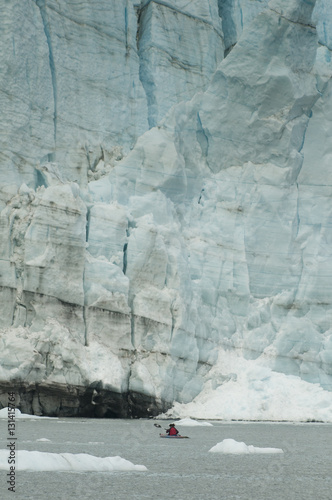 Kayaker near the Face of Marjerie Glacier, Alaska photo