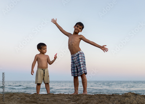 Little boys on the beach heaving fun © Jasmin Merdan