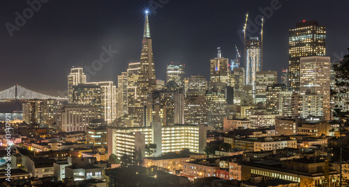Night over San Francisco Downtown from Ina Coolbrith Park. San Francisco Christmas Lights viewed from Russian Hill neighborhood.