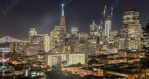 Night over San Francisco Downtown from Ina Coolbrith Park. San Francisco Christmas Lights viewed from Russian Hill neighborhood. photo