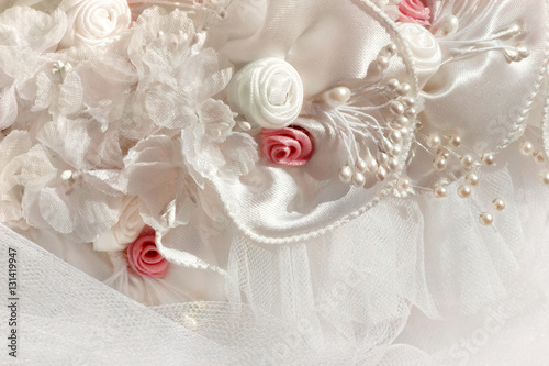Detail from pink and white bridal veil and headdress