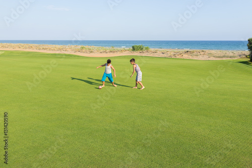 Happy children on summer gulf grass terrain having fun and happy © Jasmin Merdan