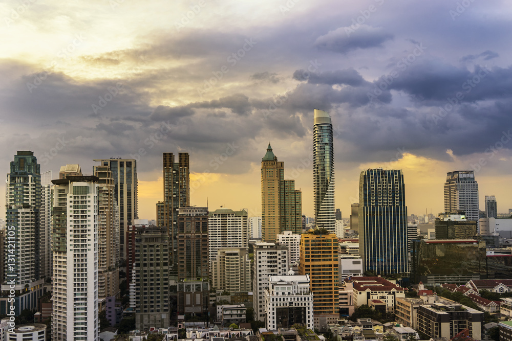 abstract cityscape on sunset time and cloud with sun light - can use to display or montage on product