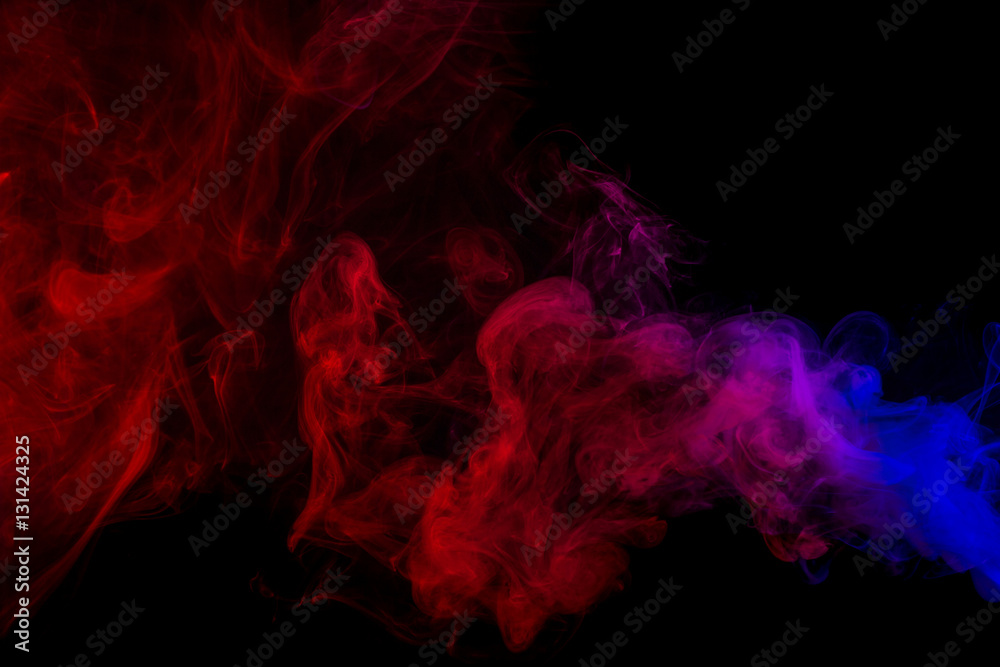 Fototapeta premium Abstract smoke Weipa. Personal vaporizers fragrant steam. The concept of alternative non-nicotine smoking. Purple pink smoke on a black background. E-cigarette. Evaporator. Taking Close-up. Vaping.