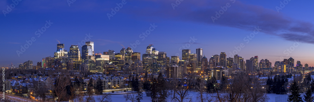 Sweeping skyline view at sunset in Calgary, Alberta. Calgary is home to many oil companies. 