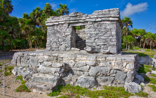The Mayan ruins in Tulum, Mexico. The ruins were built on tall cliffs on the Caribbean Sea. Tulum was one of the last cities built and inhabited by the Maya.
