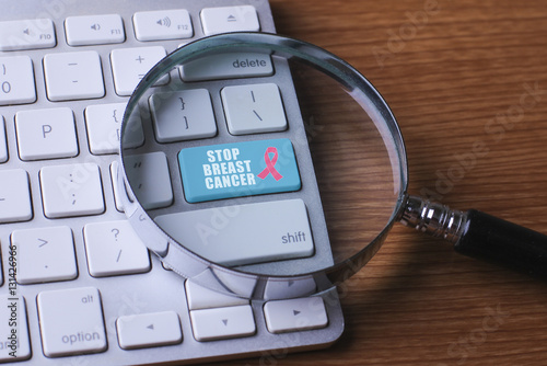 HEALTH CONCEPT : STOP BREAST CANCER on computer keyboard backgrond