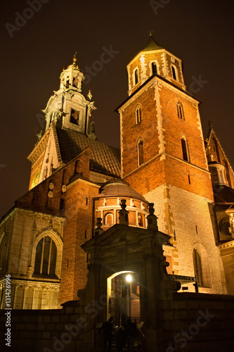 View of the Wawel Royal Archcathedral Basilica of Saints Stanislaus and Wenceslaus as part of Wawel castle architectural complex on the Wawel Hill at winter night, Krakow, Poland.