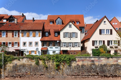 Ancient blocked residential building, located along the quay. Front view. Bietigheim, Baden-Wurttemberg, Germany.