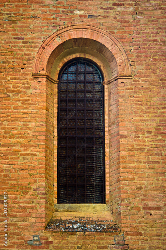 Window of Romanesque brick church