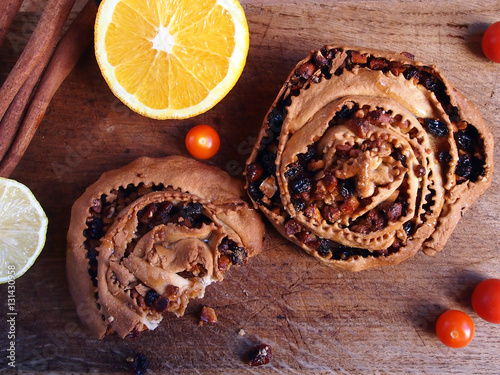 Italian food - the pitta 'mpigliata or pitta 'nchiusa, a traditional calabrian christmas sweet with cinnamon, raisins, candied fruit, honey, walnuts, almonds, hard wheat pastry.