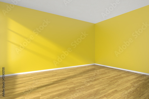 Corber of yellow empty room with wooden parquet floor