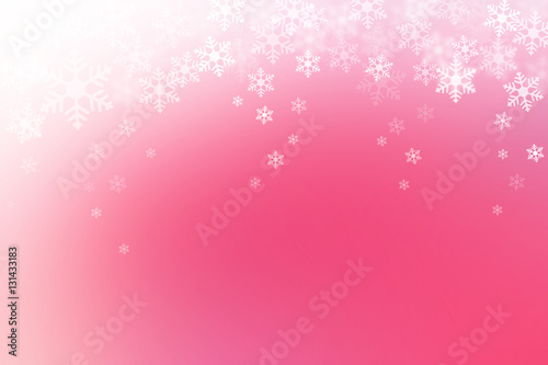 Abstract winter background, snow flakes falling on pink gradient