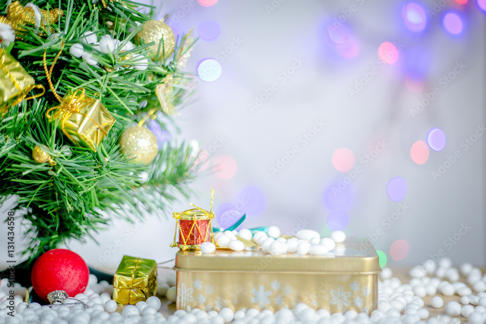 Gift boxes and ornaments in Merry Christmas and Happy New Year concept with bokeh background, can be use for make a greeting cards. Gift boxes and ornaments in Merry Christmas and Happy New Year concept with bokeh background, can be use for make a greeting cards.
