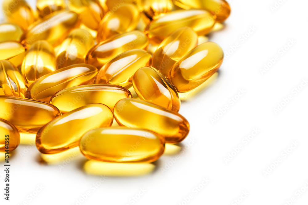 Heap of capsules Omega 3 on white background. Close up, high resolution product. Heap of capsules Omega 3 on white background. Close up, high resolution product.