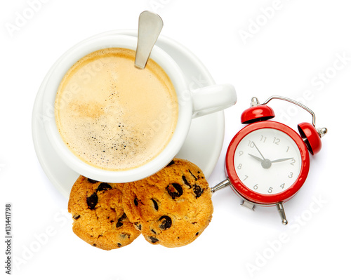 cup of coffee and alarm clock on white background